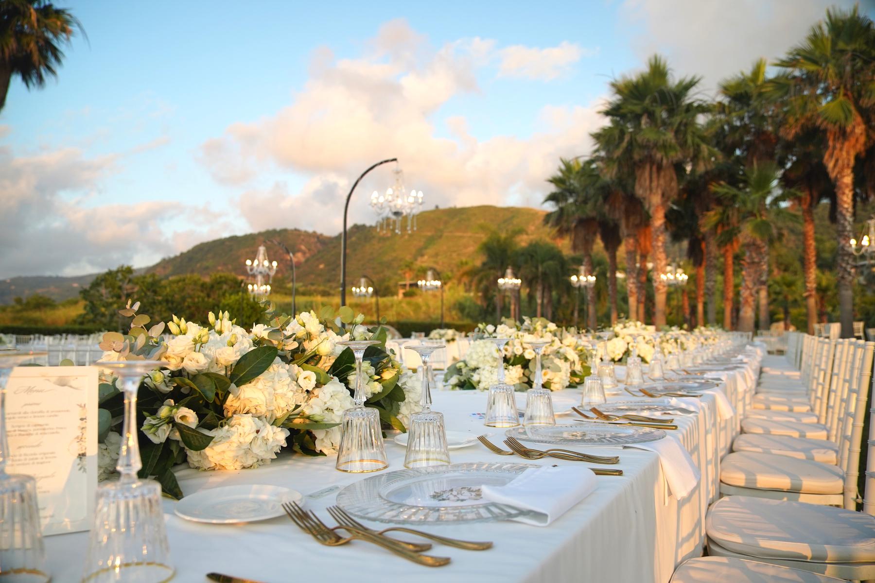 Long table among the palms